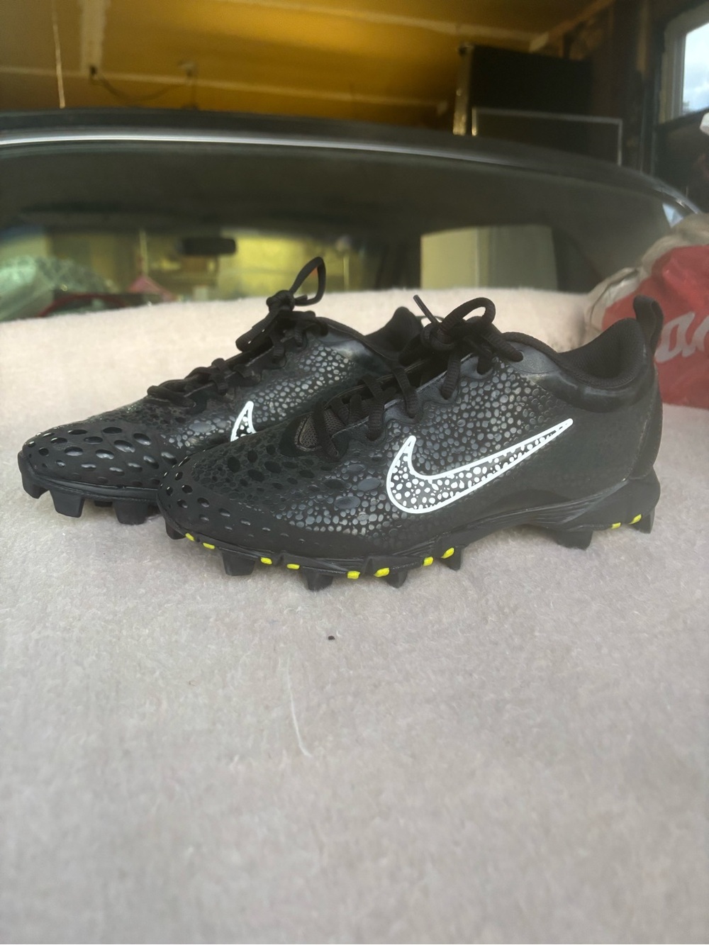 Nike Kids Black Sneakers with White Swoosh and Yellow Accents